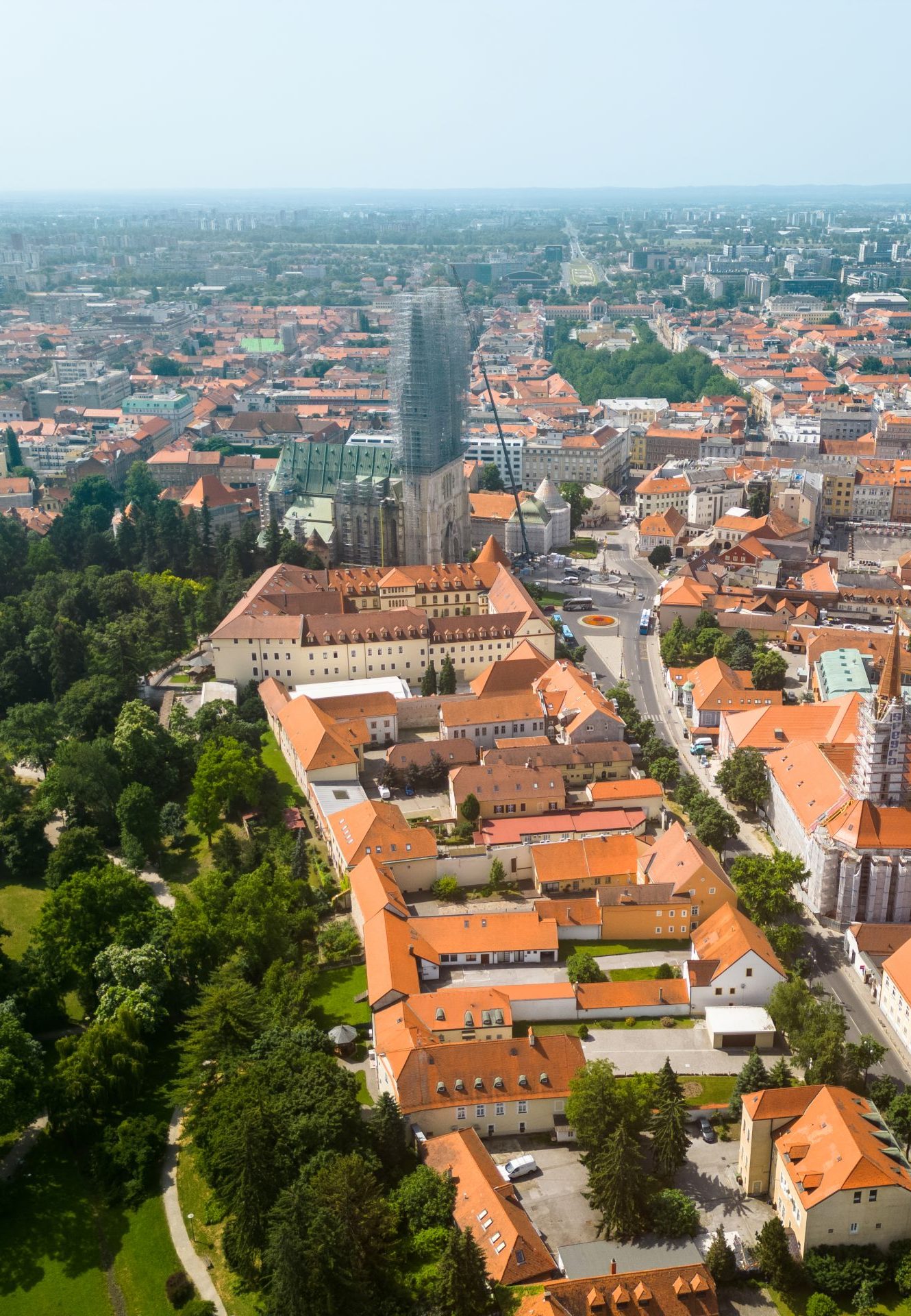 Aerial drone view of Zagreb, Croatia. Historical city centre with multiple old buildings made in national style, Zagreb Cathedral, greenery